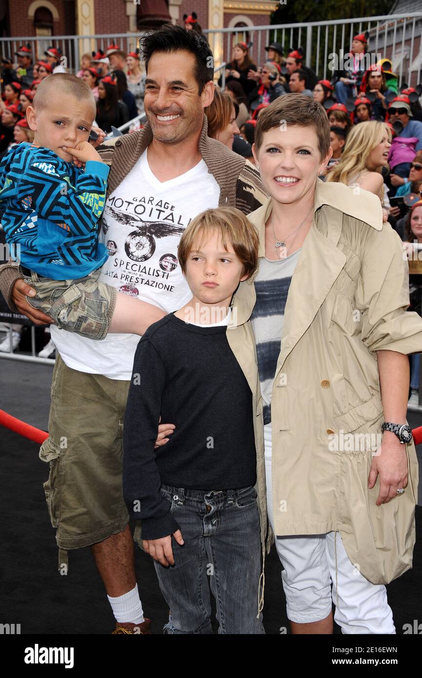 Natalie Maines and Adrian Pasdar attend the world premiere of Disney's