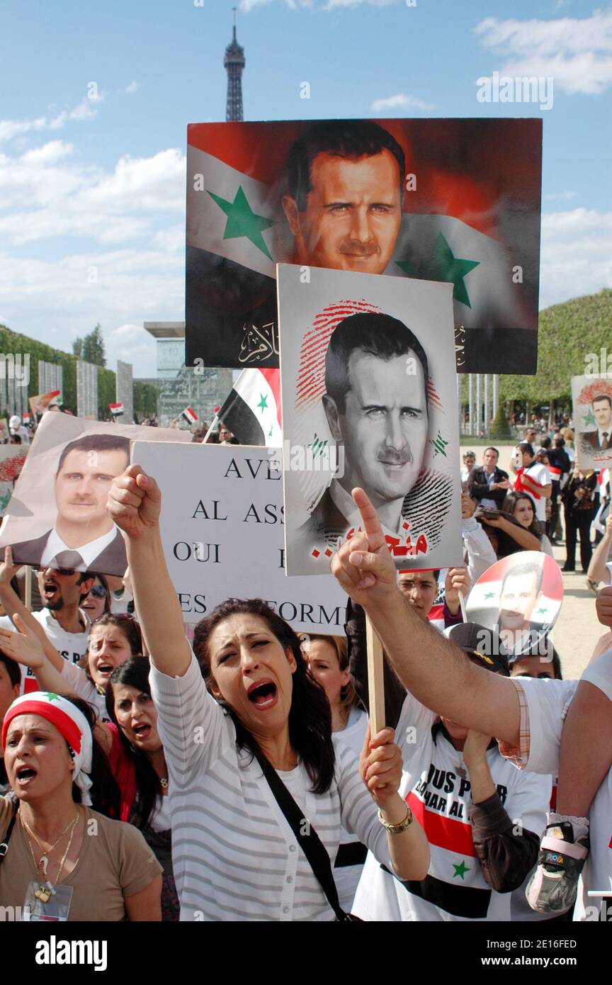 Pro Bachar Al-Assad supporters demonstrate at the Champ de Mars in Paris, France, May 8, 2011, as Syrian security forces have moved into parts of the city of Homs, a centre of the nationwide protests against President Bashar al-Assad. Photo by Alain Apaydin/ABACAPRESS.COM Stock Photo