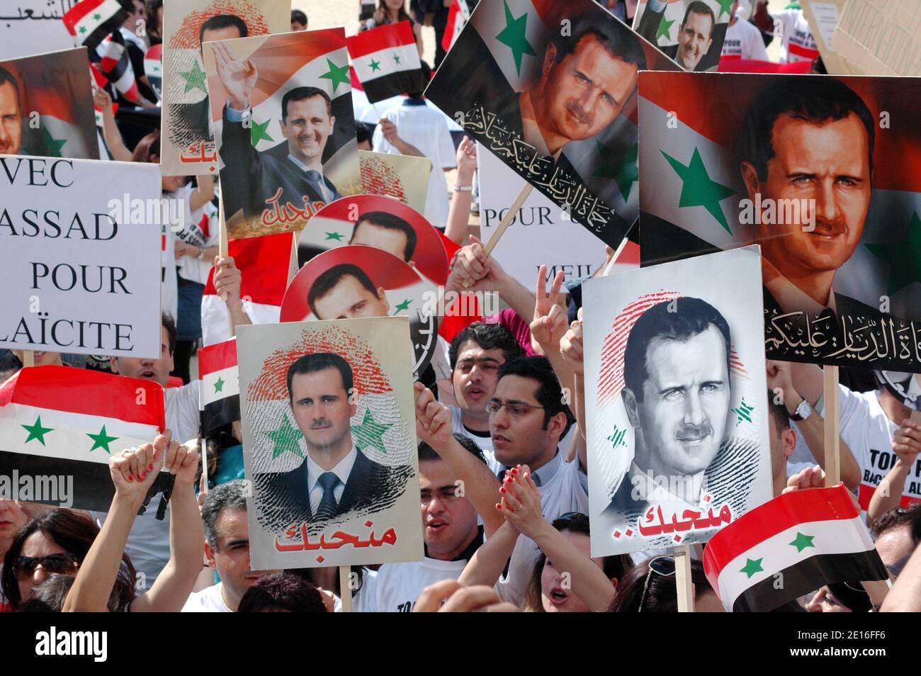 Pro Bachar Al-Assad supporters demonstrate at the Champ de Mars in Paris, France, May 8, 2011, as Syrian security forces have moved into parts of the city of Homs, a centre of the nationwide protests against President Bashar al-Assad. Photo by Alain Apaydin/ABACAPRESS.COM Stock Photo