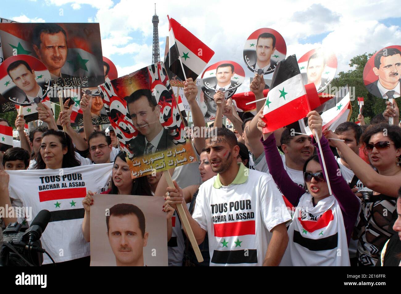 Pro Bachar Al-Assad supporters demonstrate at the Champ de Mars in Paris, France, May 8, 2011, as Syrian security forces have moved into parts of the city of Homs, a centre of the nationwide protests against President Bashar al-Assad. Photo by Alain Apaydin/ABACAPRESS.COM Stock Photo