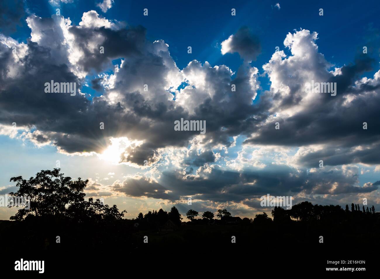 Wild angle view of a back light on the clouds in summer Stock Photo