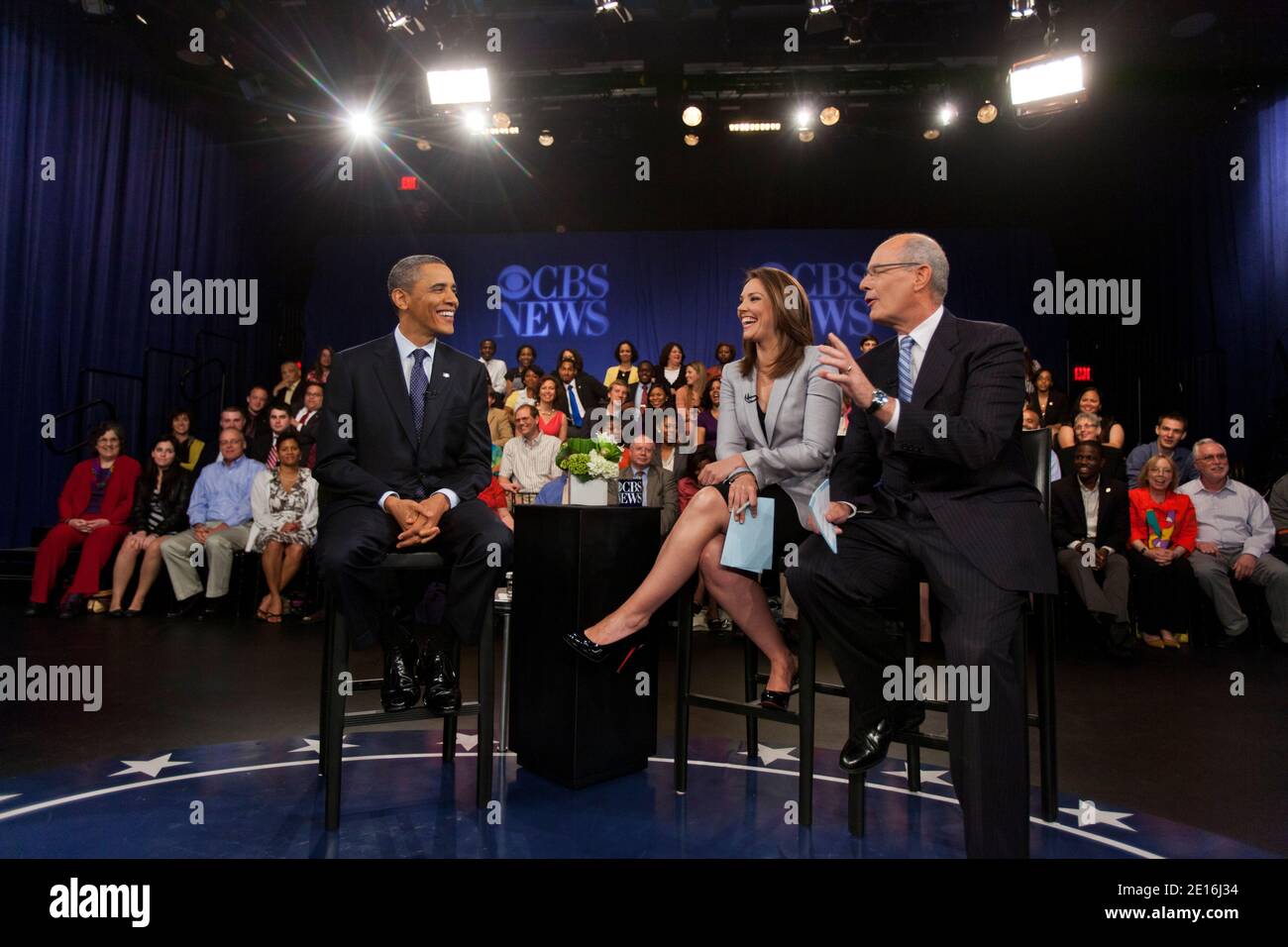 U.S. President Barack Obama, along with Early Show co-anchor Erica Hill (L) and CBS News correspondent Harry Smith (R), laugh during a pause in the taping of a CBS News Town Hall Meeting on the Economy at the Newseum in Washington, DC on May 11, 2011. Photo by Jim Lo Scalzo/Pool/ABACAPRESS.COM Stock Photo