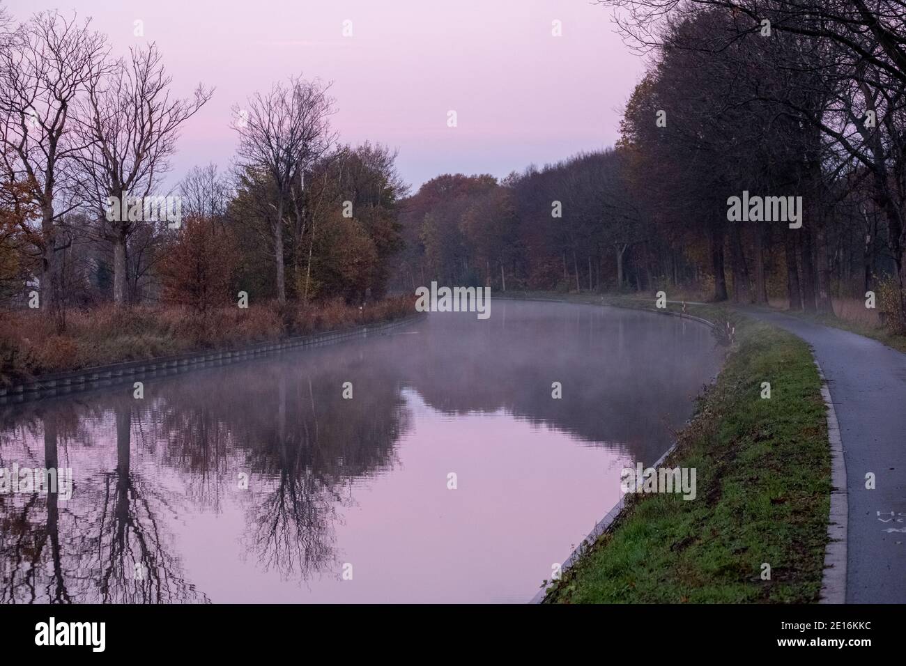 Natural Stream Canals River stream canal bending with grass banks and wild flowers and trees ...