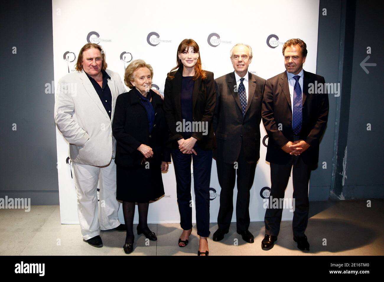 French actor Gerard Depardieu, former first lady Bernadette Chirac, French First Lady Carla Bruni-Sarkozy, Culture Minister Frederic Mitterrand and Minister for National Education, Youth and Voluntary Organizations Luc Chatel pose before the launch of Bruni-Sarkozy's foundation to combat illiteracy at Centre Pompidou modern art museum, also known as Beaubourg, in Paris, France on May 17, 2011. French President Nicolas Sarkozy's father, Pal Sarkozy was quoted by a German newspaper Bild today as saying that first lady Carla Bruni is expecting a child, apparently confirming the subject of weeks o Stock Photo