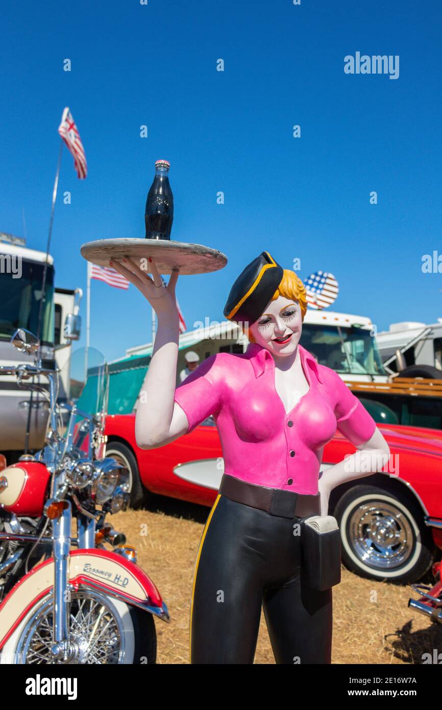 vintage mannequin of female fast food barhop server on roller skates at