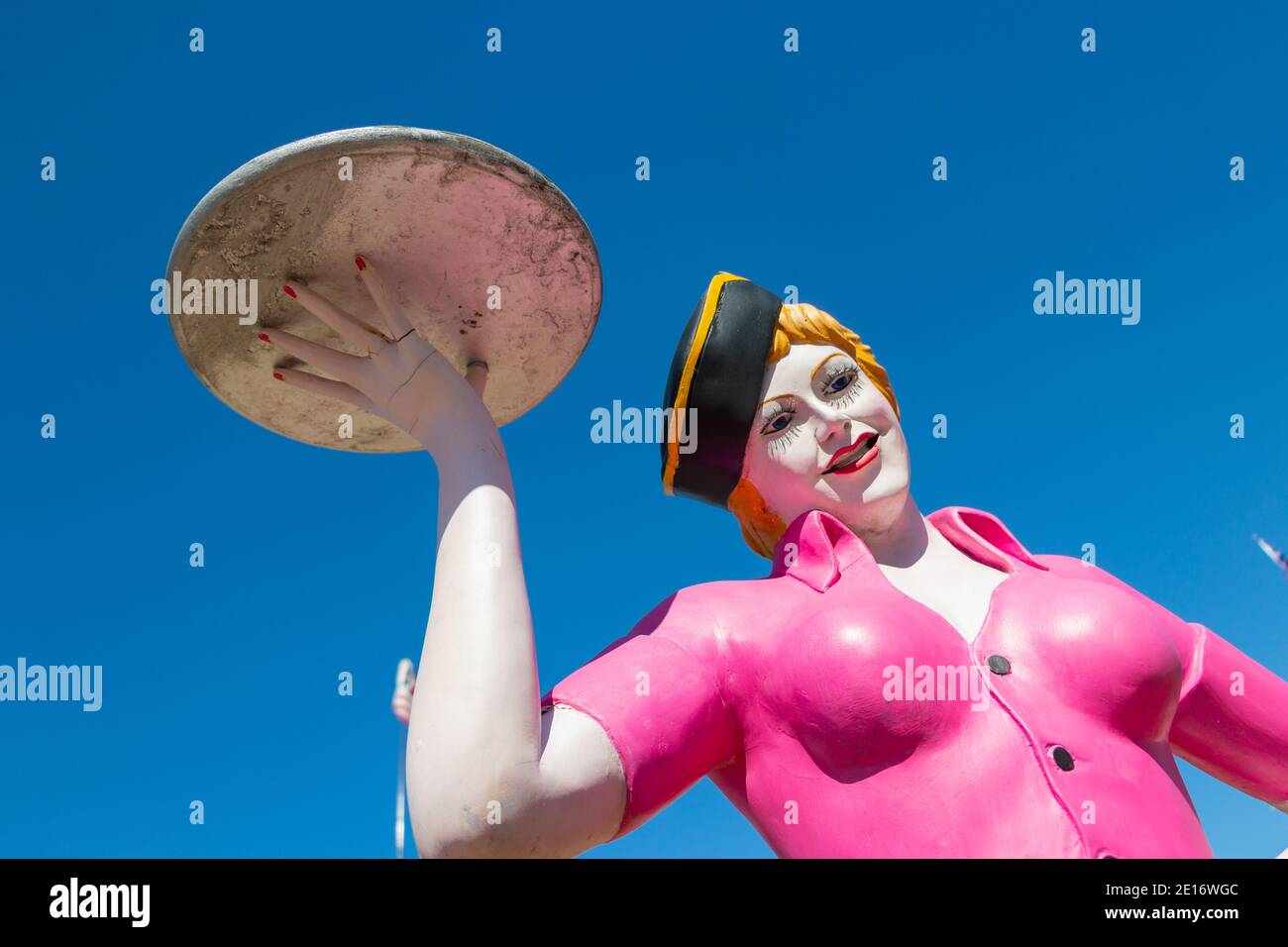 vintage mannequin of female fast food barhop server on roller skates at