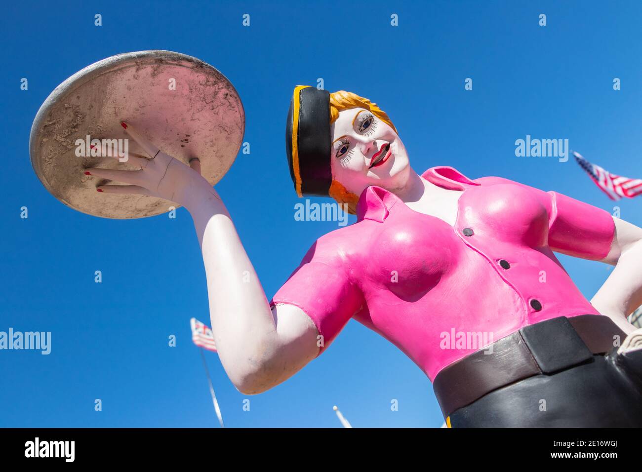 vintage mannequin of female fast food barhop server on roller skates at