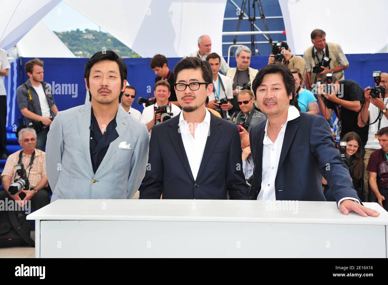 (L-R) Jung-woo Ha, Director Hong-jin Na and Yun-seok Kim at a photocall for South Korean film 'The Murderer' presented in the section Un Certain Regard as part of the 64th Cannes International Film Festival, at the Palais des Festivals in Cannes, southern France on May 18, 2011. Photo by Hahn-Nebinger-Genin/ABACAPRESS.COM Stock Photo