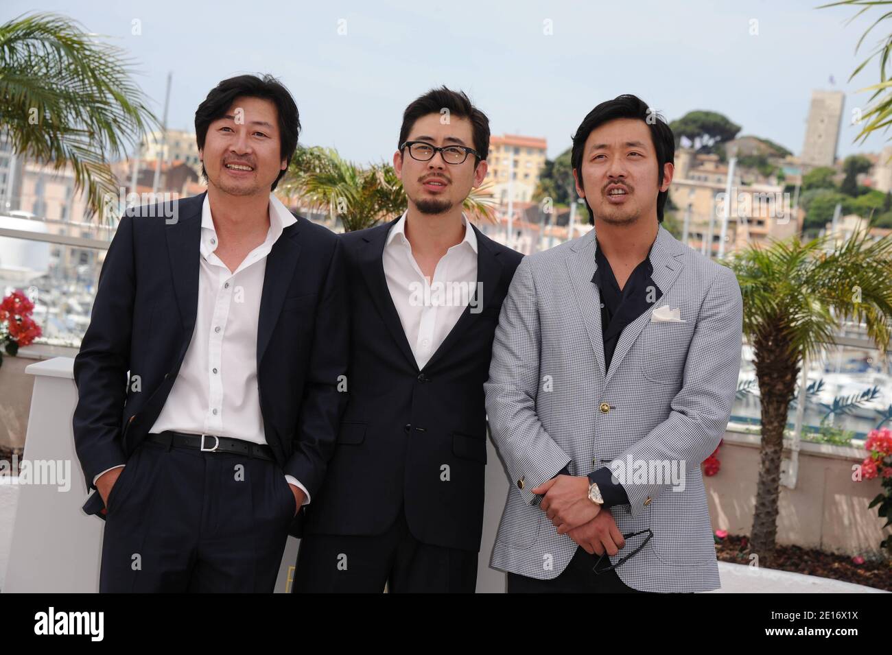 (L-R) Yun-seok Kim, Director Hong-jin Na and Jung-woo Ha at a photocall for South Korean film 'The Murderer' presented in the section Un Certain Regard as part of the 64th Cannes International Film Festival, at the Palais des Festivals in Cannes, southern France on May 18, 2011. Photo by Hahn-Nebinger-Genin/ABACAPRESS.COM Stock Photo