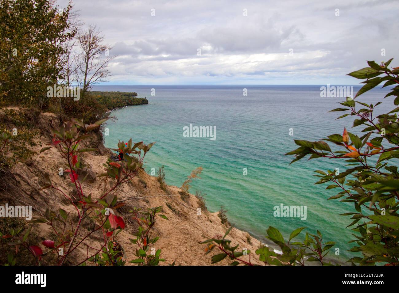 Autumn At Pictured Rocks National Lakeshore. Massive sand dune forms a large cliff on the coast of Lake Superior at the popular Log Slide Overlook. Stock Photo