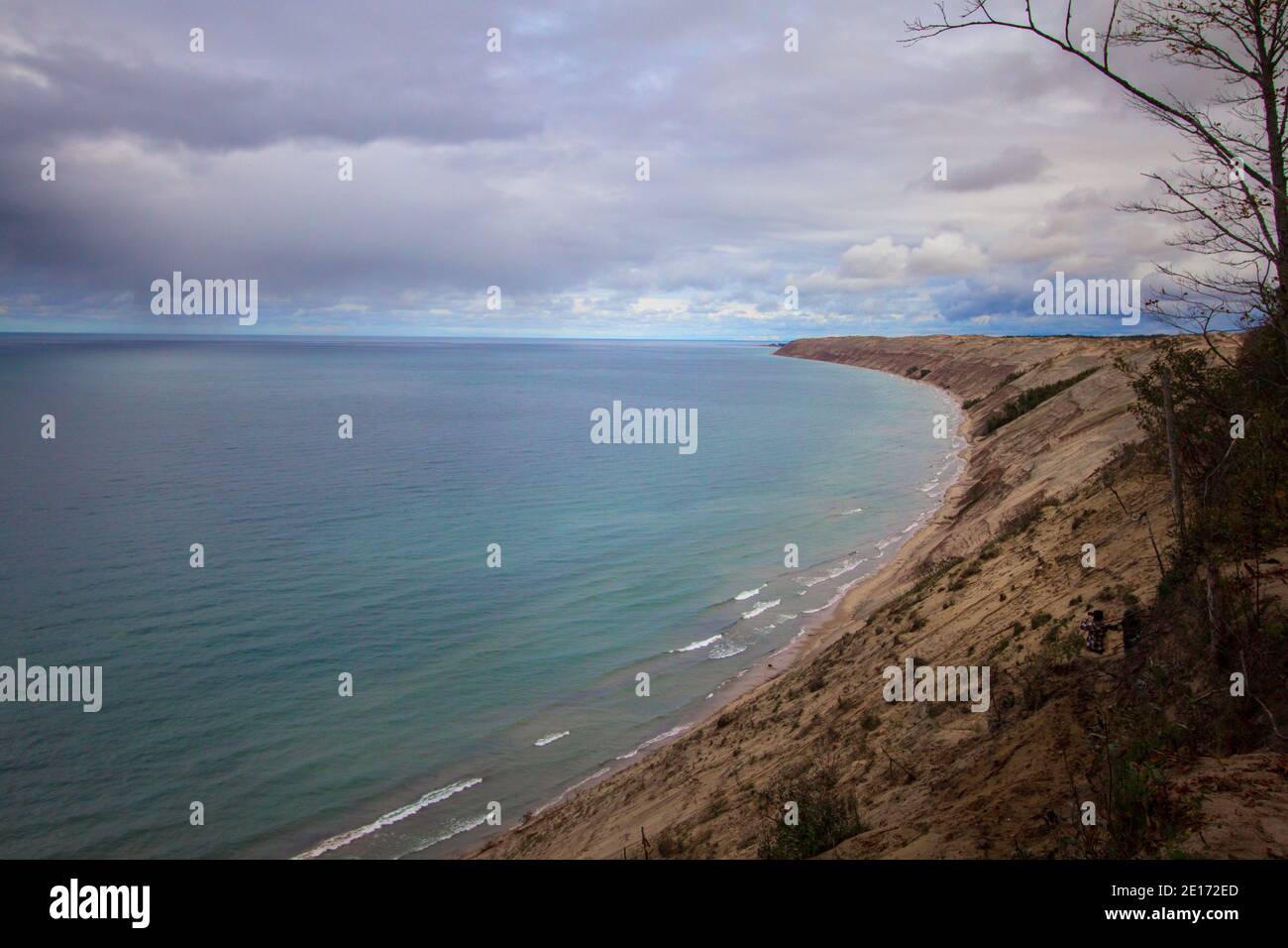 Massive sand dune on the coast of Lake Superior at the popular Log Slide Overlook along the Pictured Rocks National Lakeshore in Michigan. Stock Photo