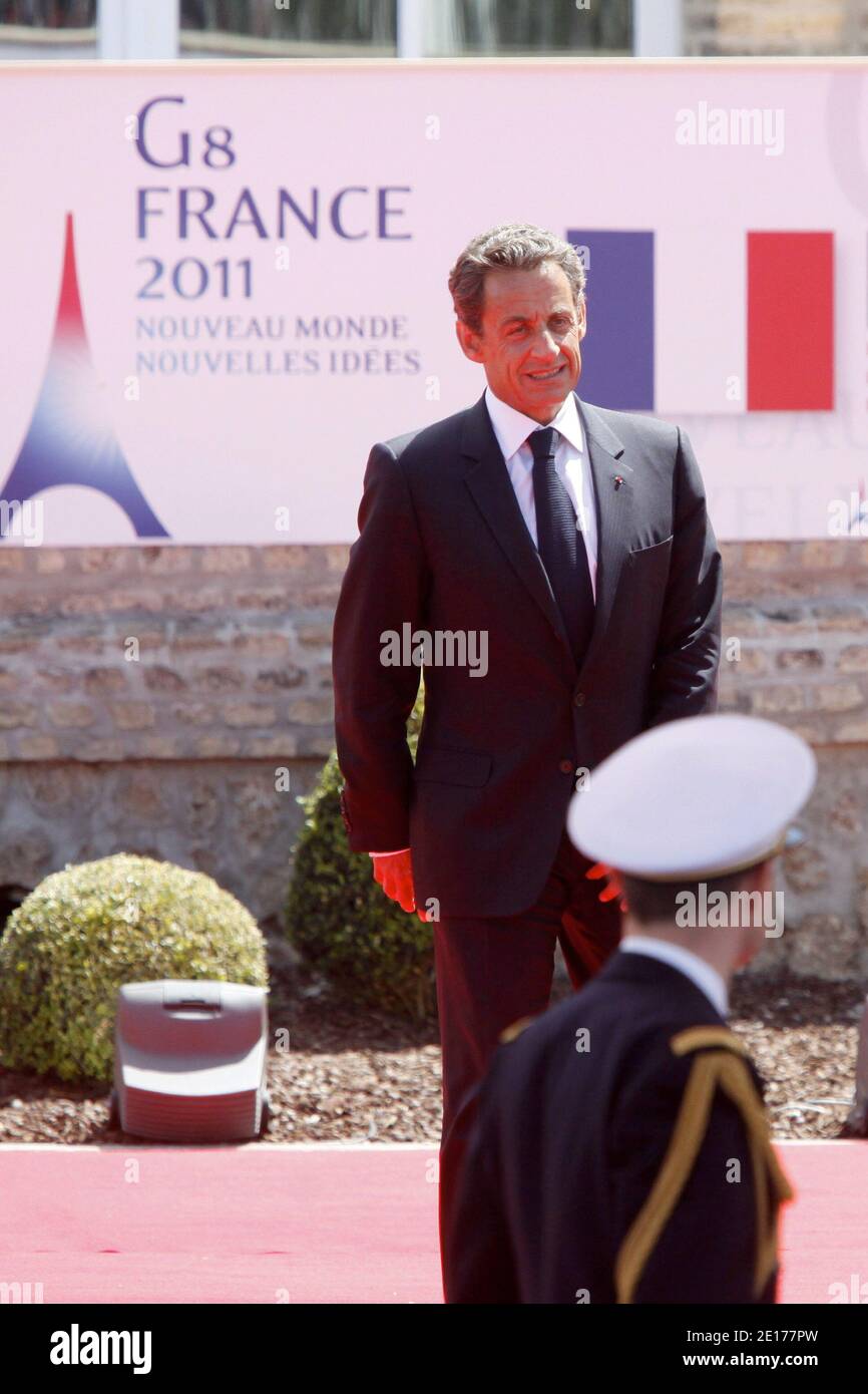 France's President Nicolas Sarkozy pictured as he leaves the Villa Le Cercle after a working lunch during the G8 summit in Deauville, France on May 27, 2011. G8 leaders sought Friday to thrash out a common position on how to support Arab democratic revolts, brandishing a threat of action against Syria and demanding Libyan leader Moamer Kadhafi go. Photo by Albert Facelly/Pool/ABACAPRESS.COM Stock Photo