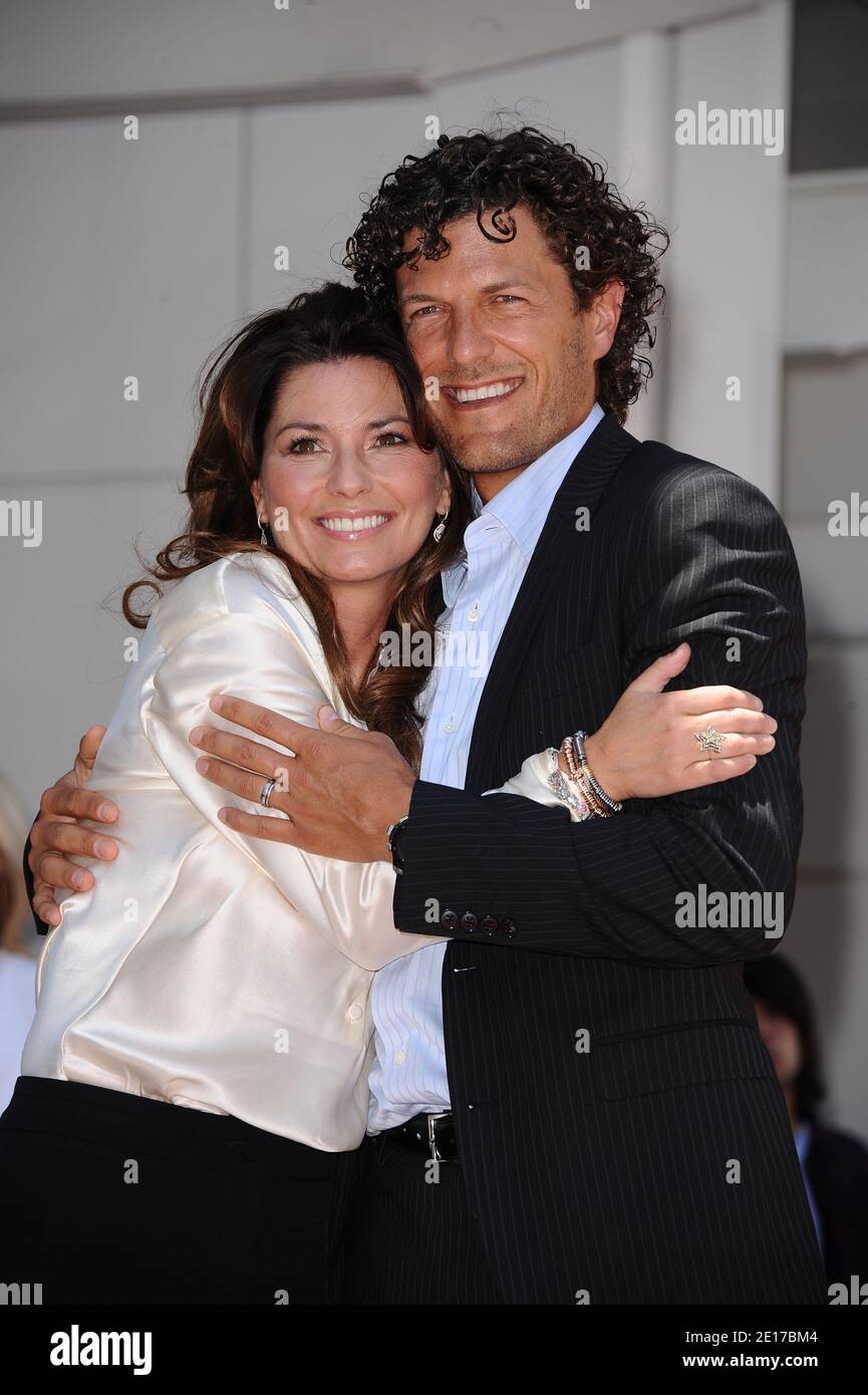 Shania Twain with her husband Frederic Thiebaud is honored with the 2