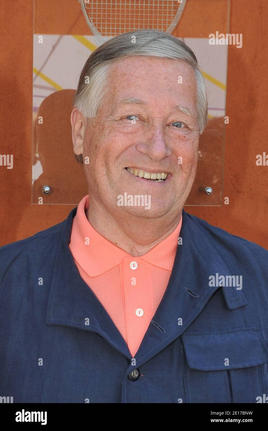 Alain Duhamel and his wife attending the French Tennis Open 2011 at