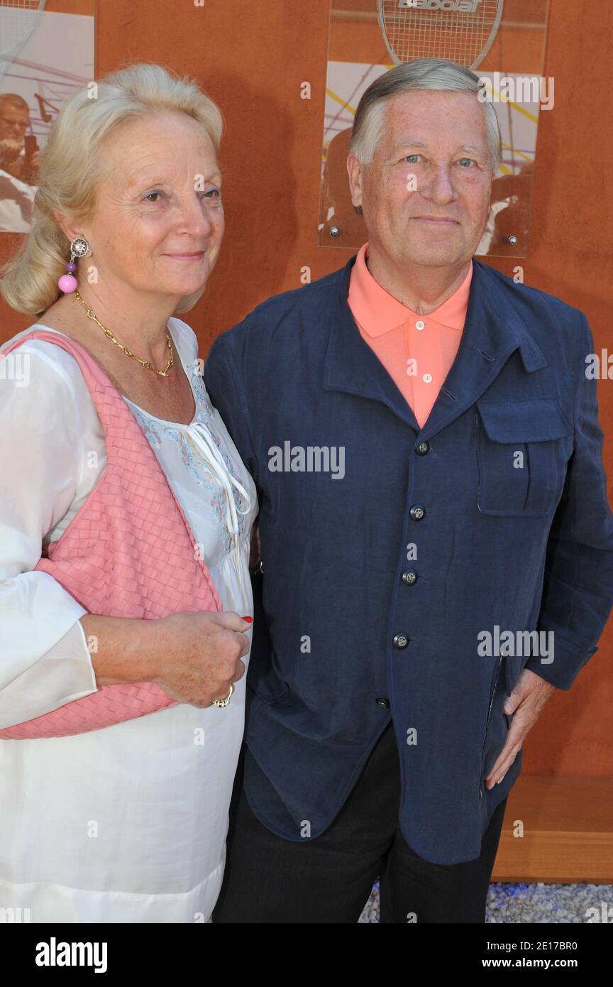 Alain Duhamel and his wife attending the French Tennis Open 2011 at