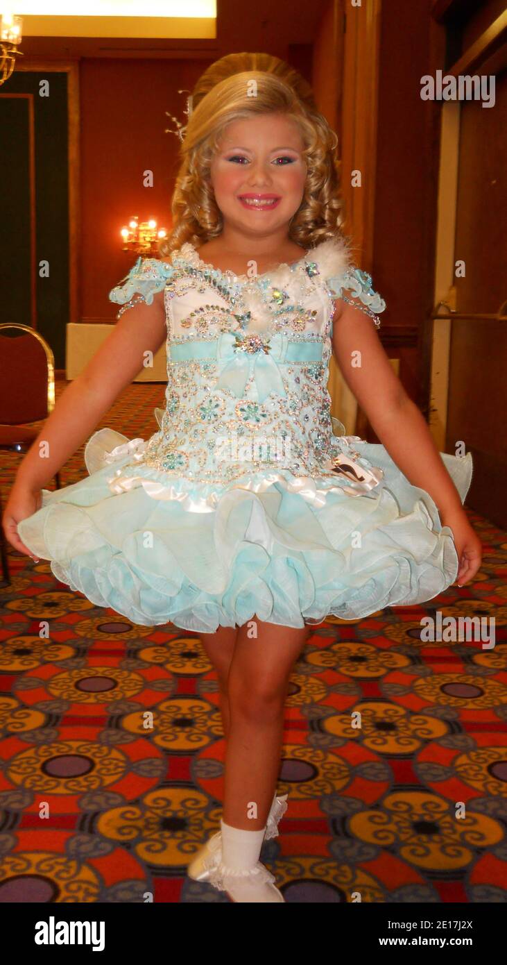 Pageant contestant Olivia poses for the camera at a competition filmed