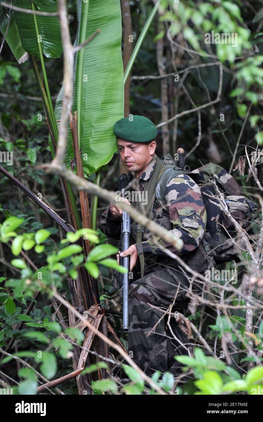 Members of 3rd Foreign Infantry Regiment (3e Régiment étranger d'infanterie, 3e REI) pictured pictured during a patrol the Mangrove, near Kourou French Guiana, on June 2011. The regiment is stationed in French Guiana, protecting the Centre Spatial Guyanais during the year and in period of launch to the deplyment of the device baptized Titan. Tiatan is the name of the defense system of the Centre Spatial Guyanais deployed during eb-very launch of Ariana 5. Photo by Thierry Orban/ABACAPRESS.COM Stock Photo