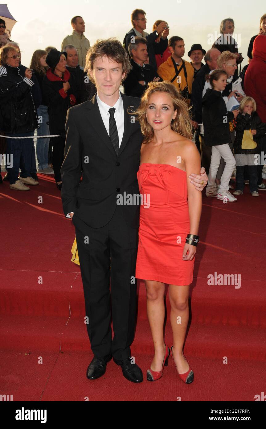 Actor Swann Arlaud and actress Fanny Touron arrive to the closing