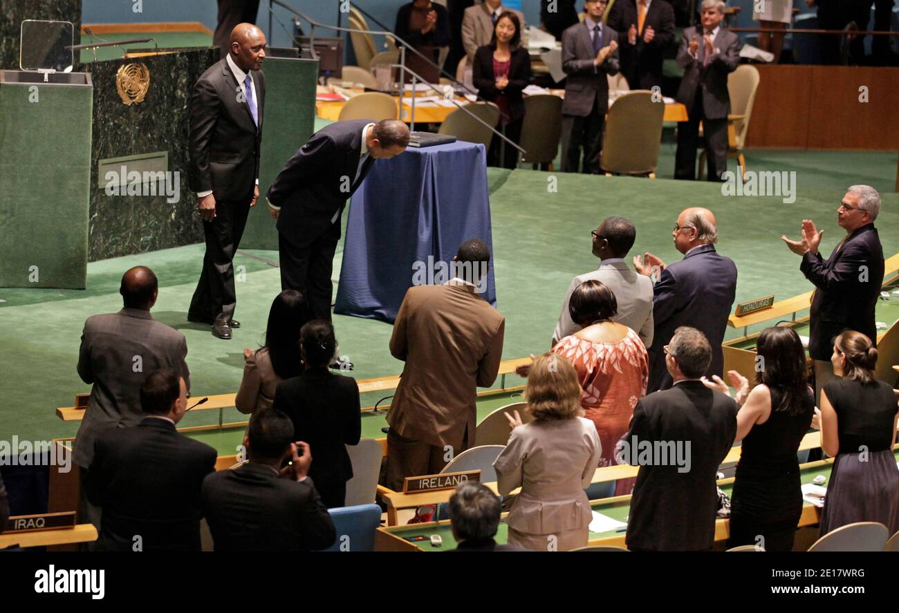 Ban Ki-moon takes the oath of office as he is sworn in for a second ...