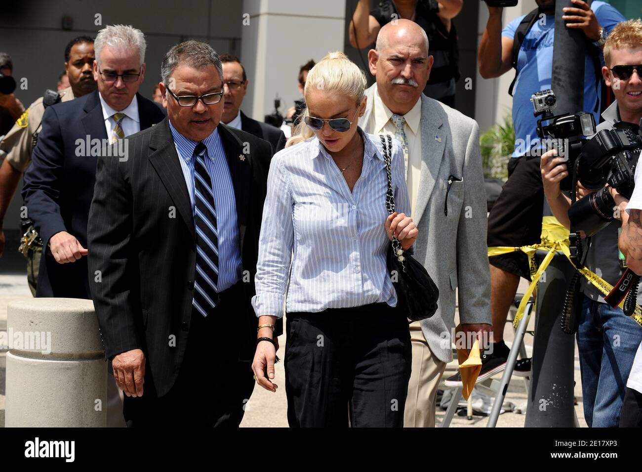 US Actress Lindsay Lohan leaves the building after a probation hearing at Airport Branch Courthouse on June 23, 2011 in Los Angeles, CA, USA. Lohan was called into court after testing positive for alcohol in a recent test. But Judge Stephanie Sautner determined that an earlier order from a different judge requiring her to be tested for alcohol had already expired -- so there is no requirement that she abstain from drinking. Sauter ordered Lohan to stop having parties while she is on house arrest for a probation violation. Photo by Lionel Hahn/ABACAPRESS.COM Stock Photo