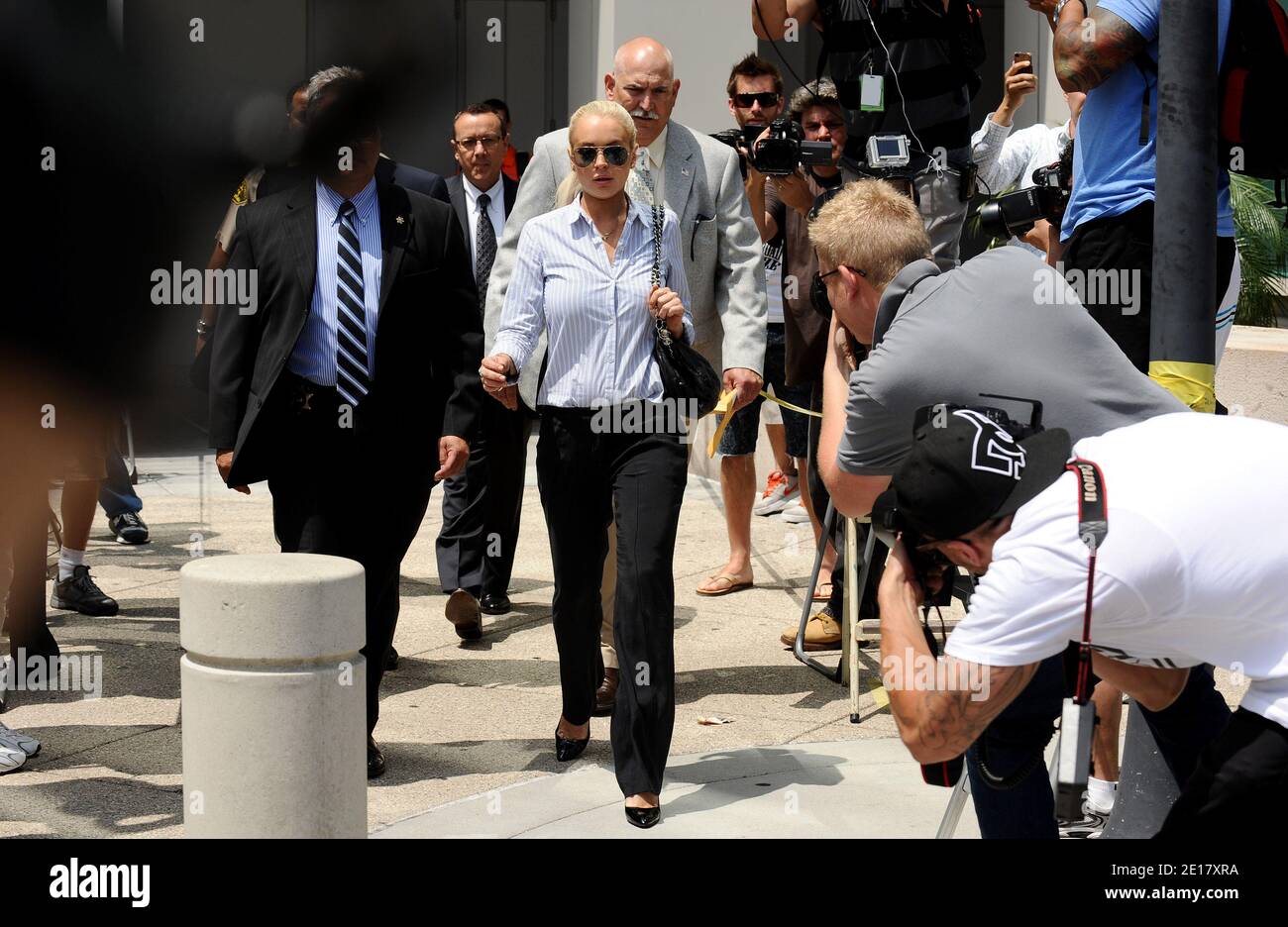 US Actress Lindsay Lohan leaves the building after a probation hearing at Airport Branch Courthouse on June 23, 2011 in Los Angeles, CA, USA. Lohan was called into court after testing positive for alcohol in a recent test. But Judge Stephanie Sautner determined that an earlier order from a different judge requiring her to be tested for alcohol had already expired -- so there is no requirement that she abstain from drinking. Sauter ordered Lohan to stop having parties while she is on house arrest for a probation violation. Photo by Lionel Hahn/ABACAPRESS.COM Stock Photo