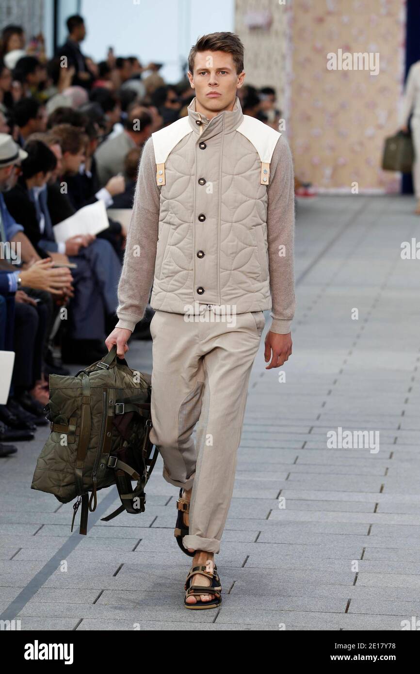 A model wears a creation by Kim Jones as part of Louis Vuitton Men's  fashion Spring Summer 2012 collection presented during the Paris Men's  Fashion Week, in Paris, France, June 23, 2011.
