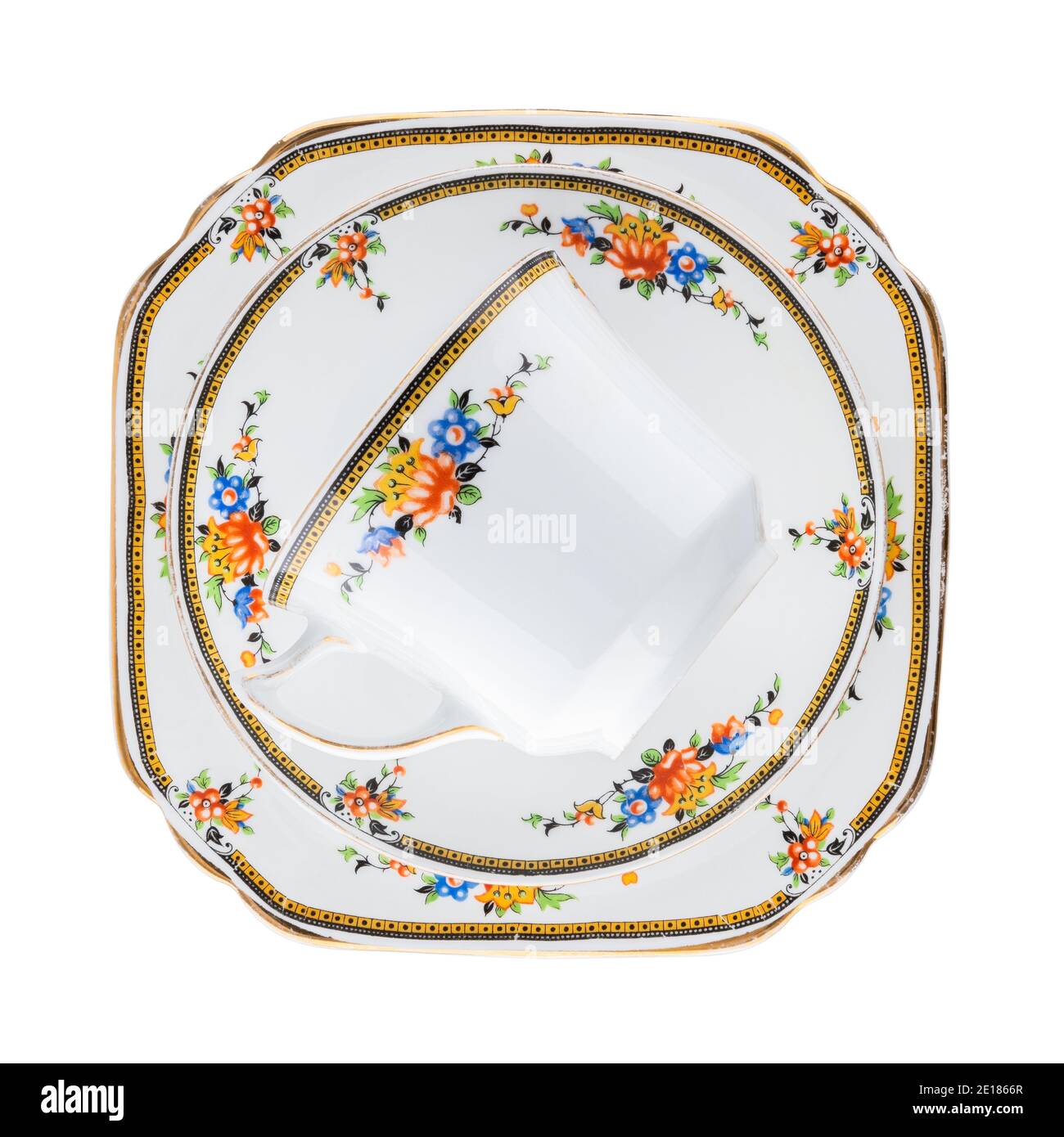 Vintage porcelain teacup and saucer isolated on white background. Full