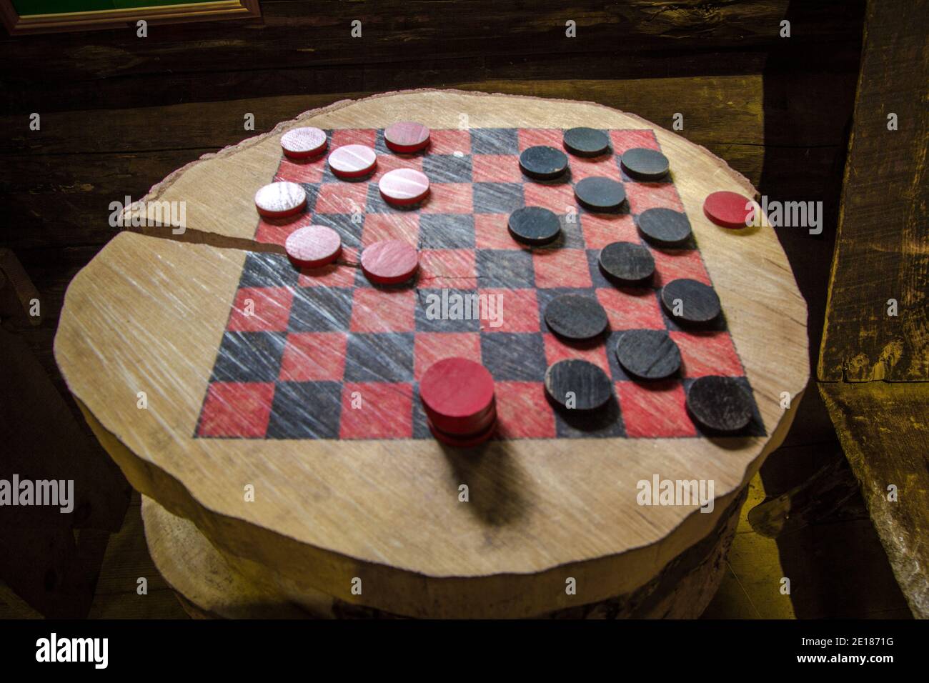 Traditional board game of checkers in horizontal orientation and shot from above. Stock Photo