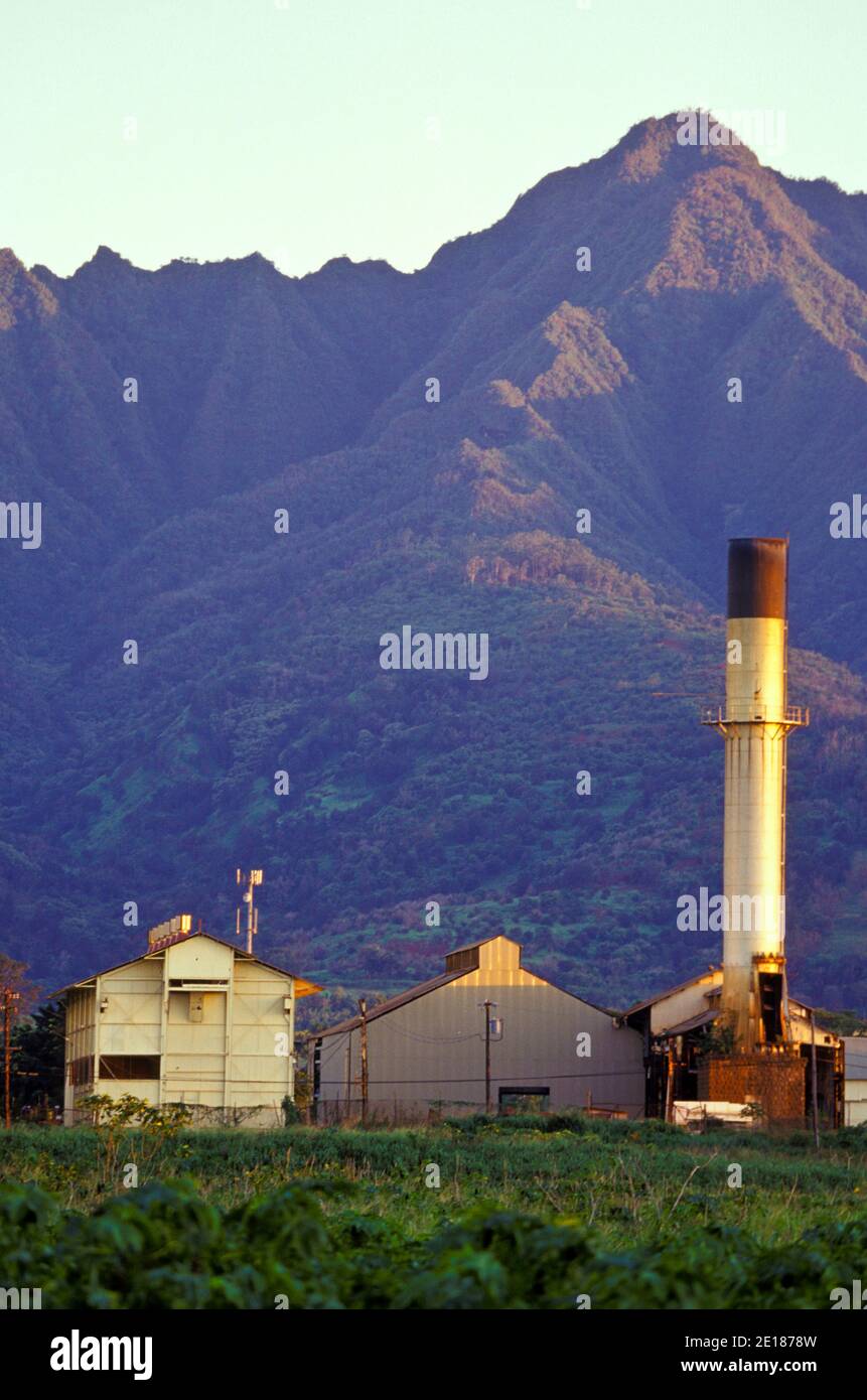 Waialua Sugar Mill with Mount Kaala in bakground at sunset Stock Photo