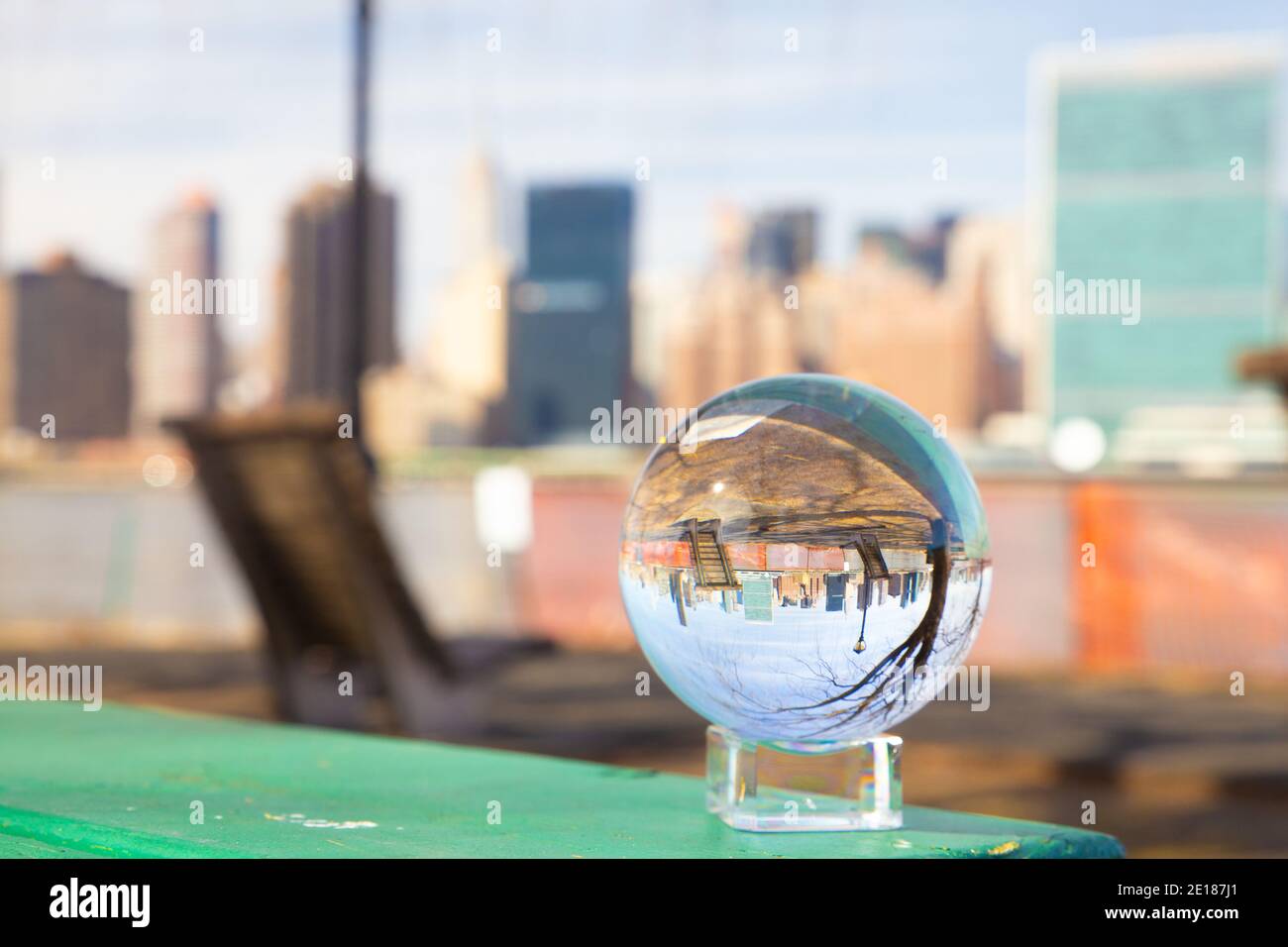 New York City seen through glass ball from Long Island City Stock Photo