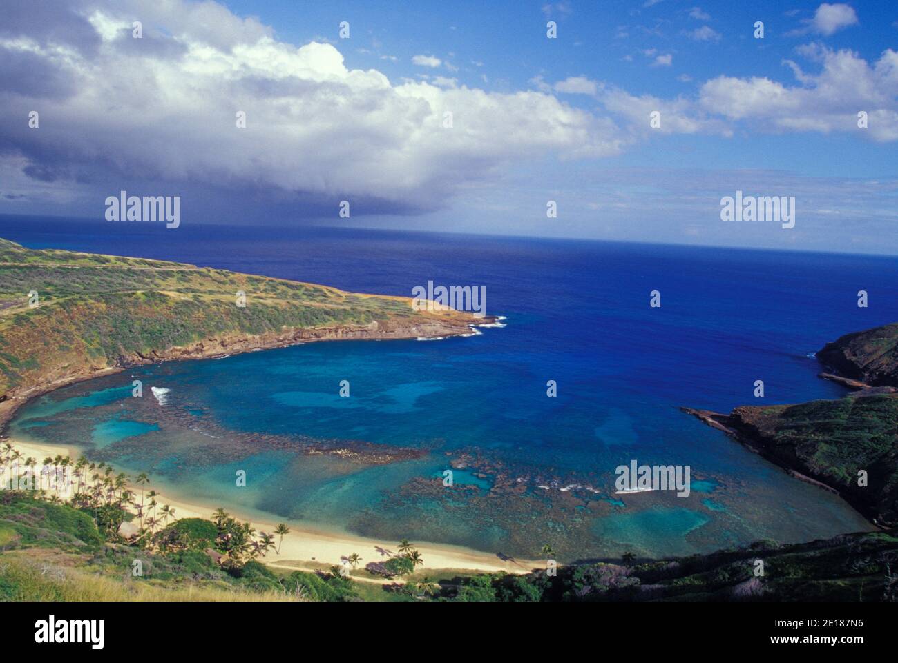 White sand beach and clear blue water over reef, seen from above Hanauma Bay, Oahu, Hawaii Stock Photo