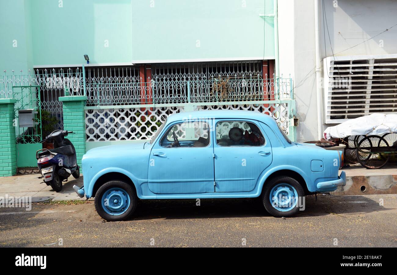 An old car parked in in the old town in Pondicherry, India. Stock Photo