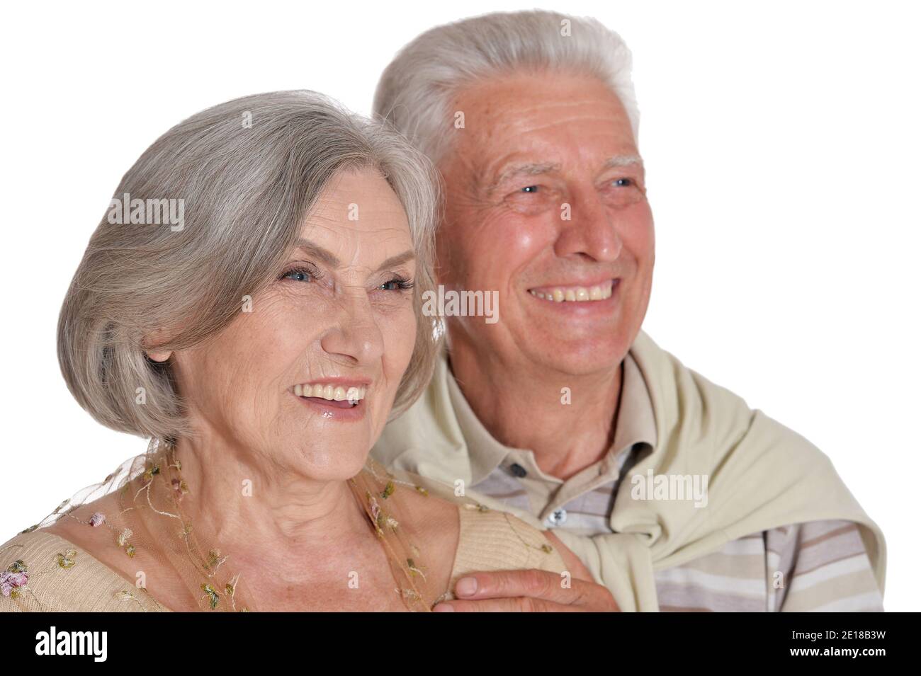 Close-up portrait of happy senior couple hugging Stock Photo