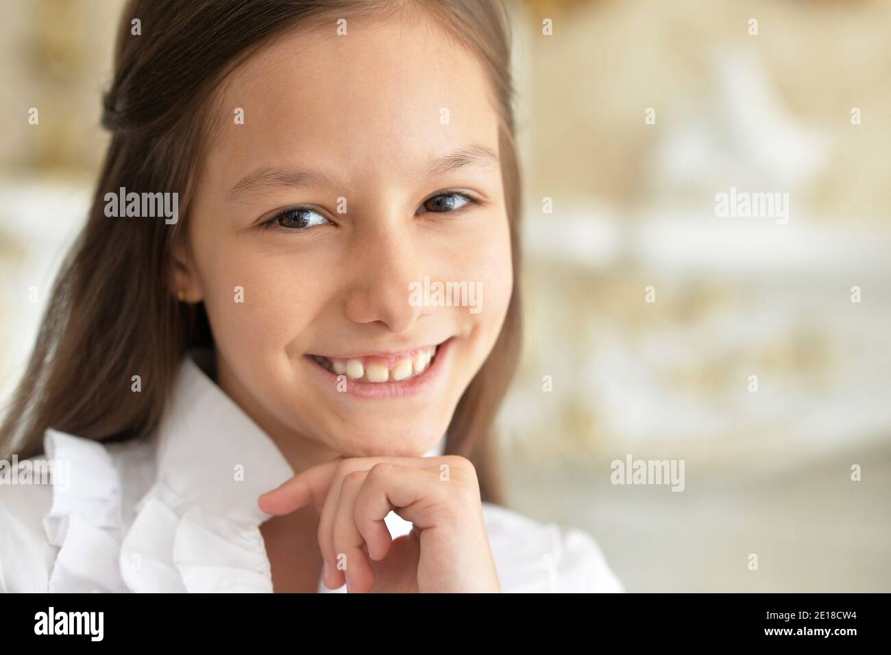 Close-up portrait of emotional little girl in white blouse Stock Photo ...