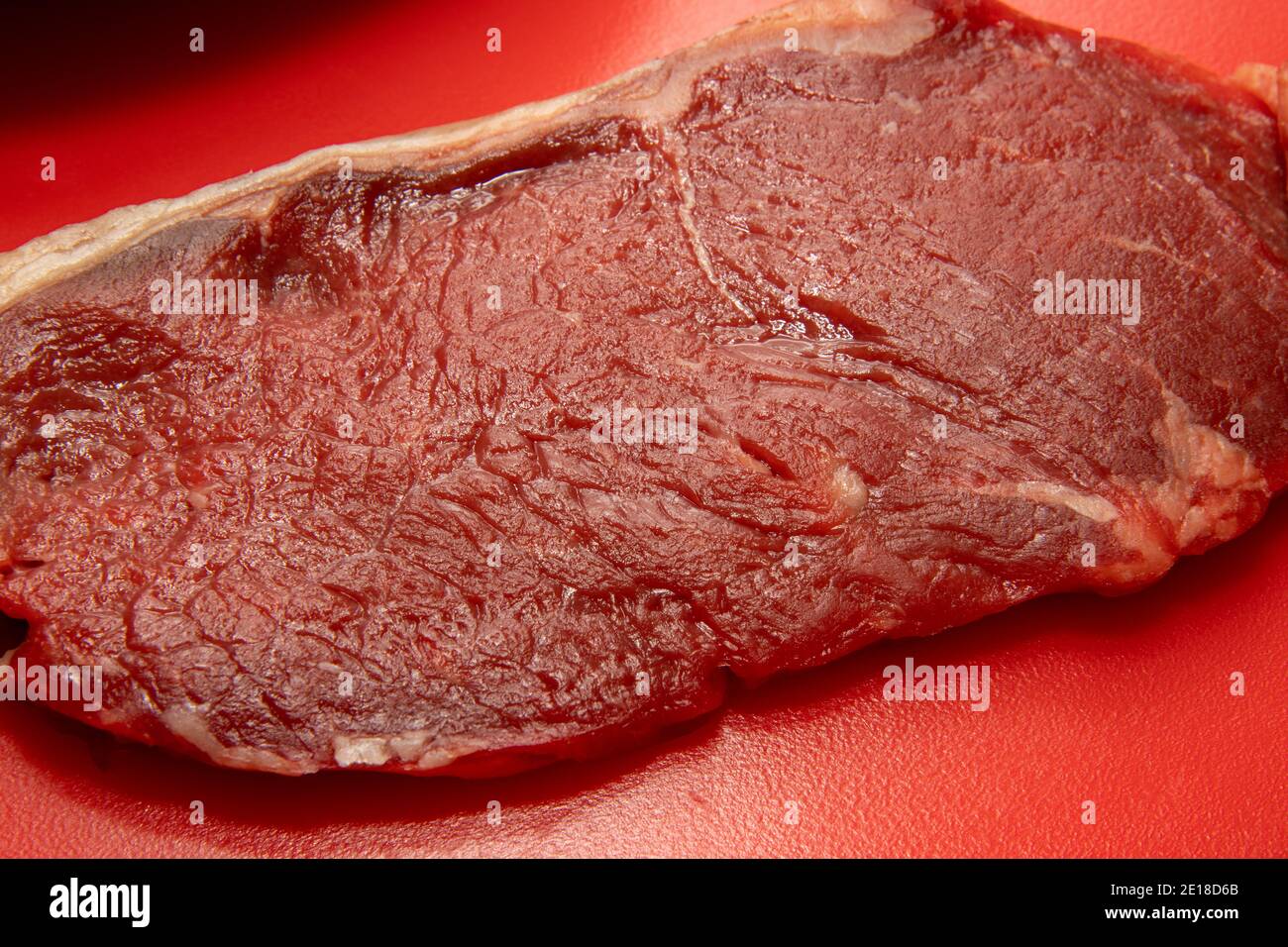 A raw un-cooked beef stake Stock Photo