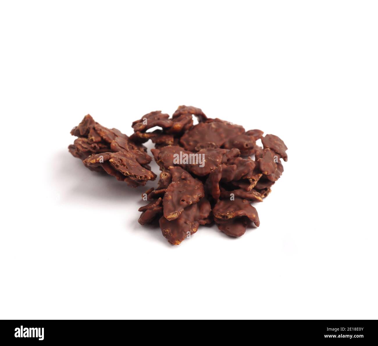Tasty organic homemade corn flakes cookies with chocolate on a white background Stock Photo