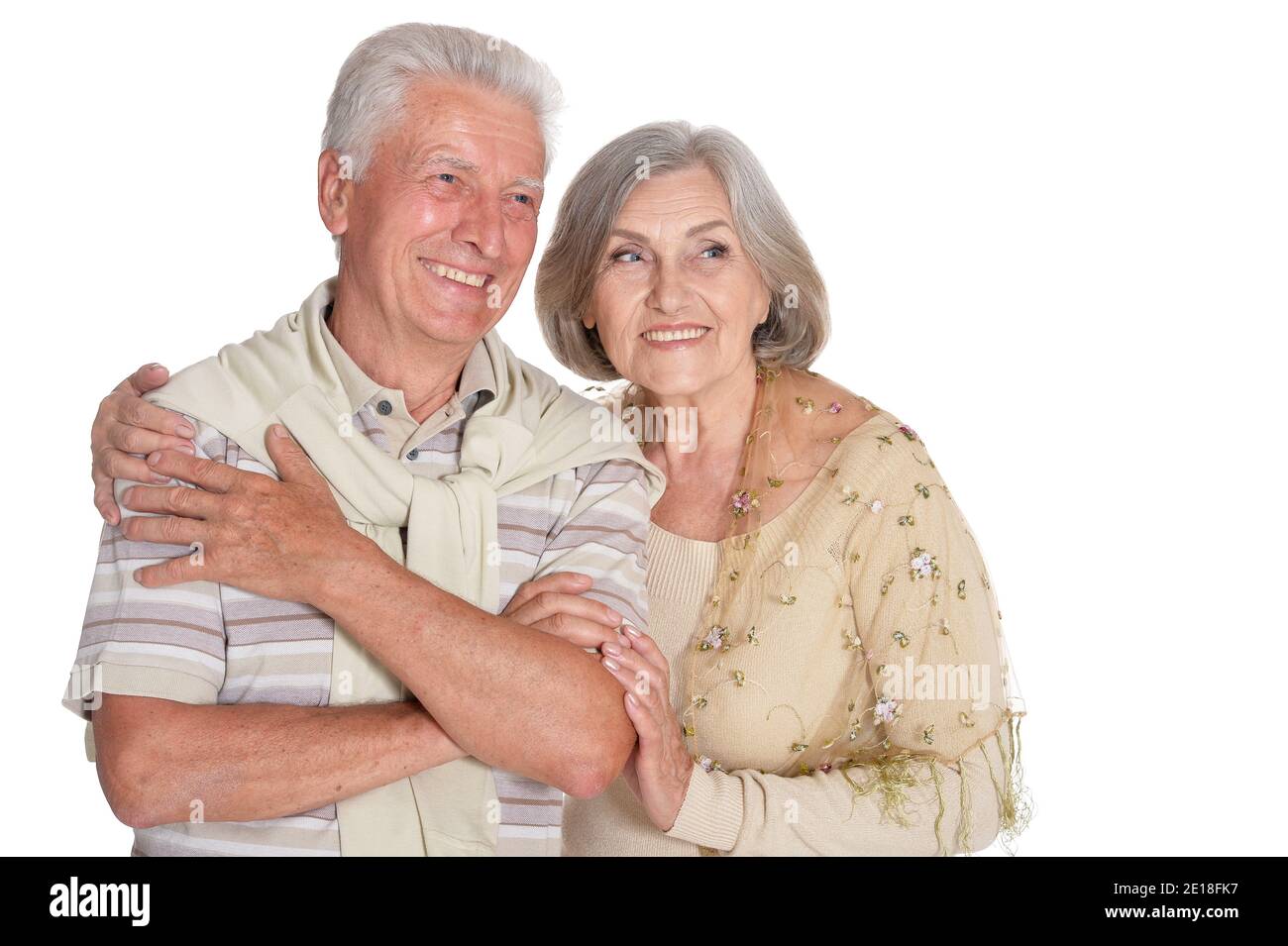 Happy senior couple hugging isolated on white background Stock Photo