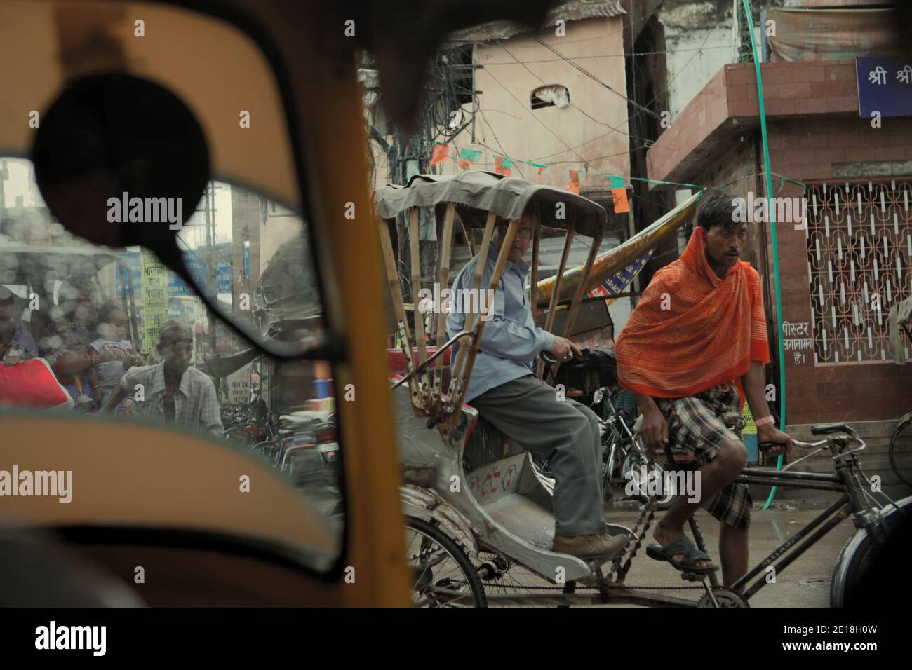 Rickshaw drivers trying to get through heavy traffic in Varanasi, Uttar Pradesh, India. Stock Photo