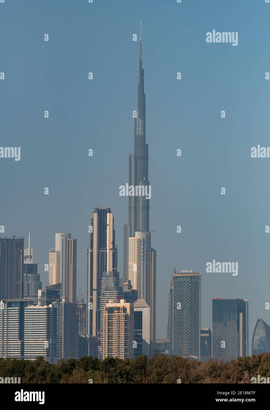 A vertical shot of the cityscape of Dubai, with it's modern architecture and skyscrapers. Stock Photo