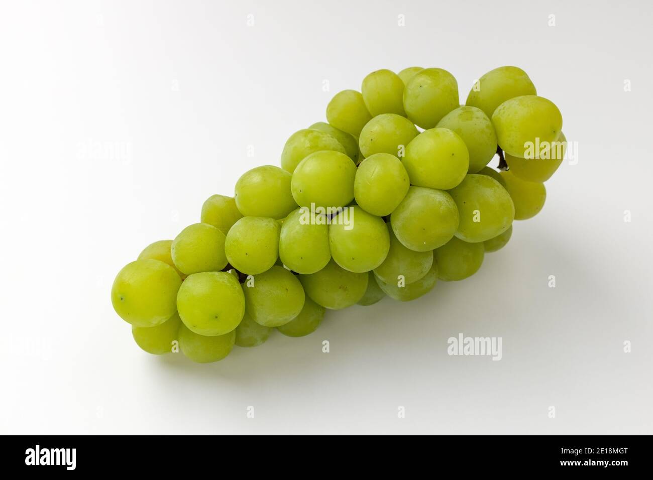 Green grapes on white background Stock Photo