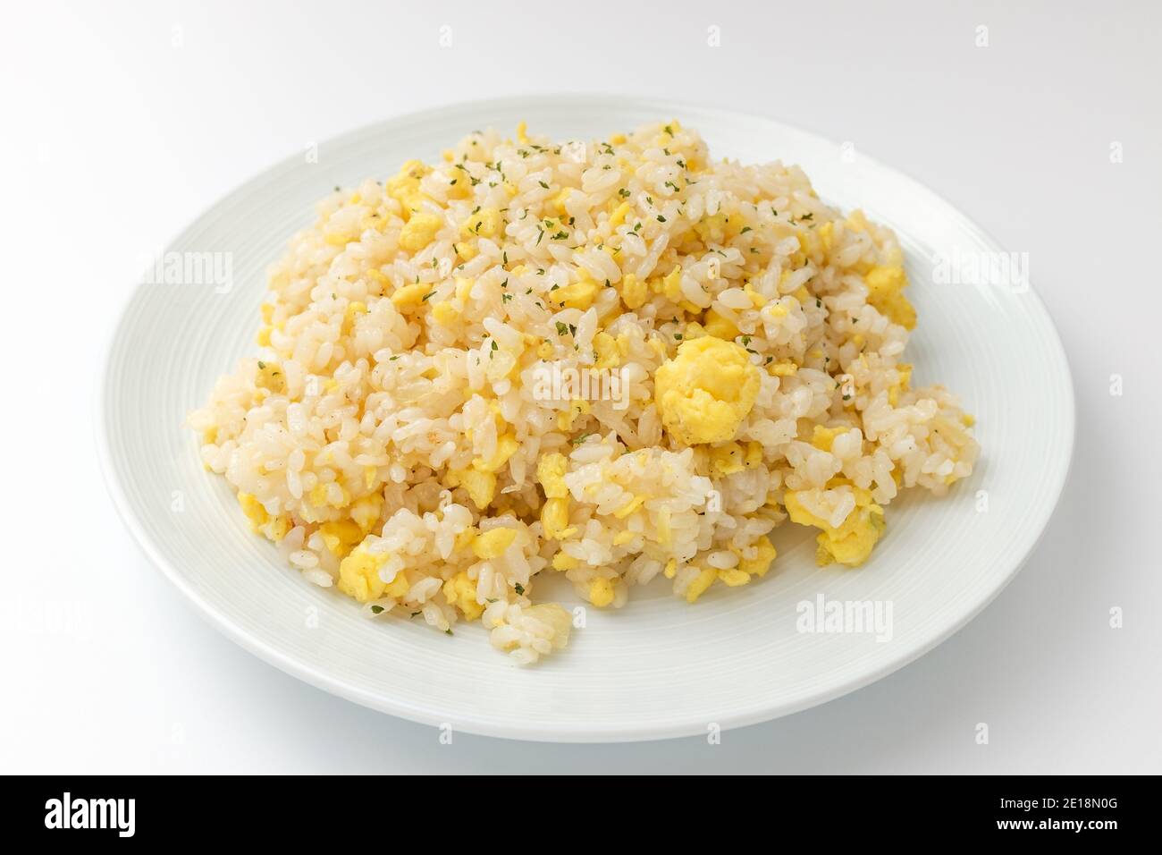 Fried rice with egg on white background Stock Photo