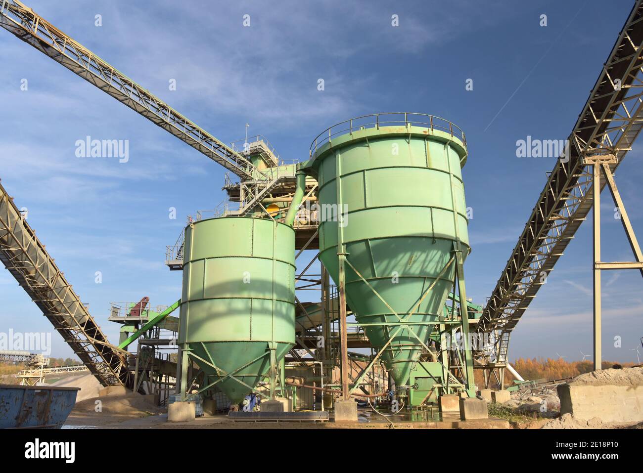 Gravel pit: building and wheel loader loading gravel onto a truck Stock ...