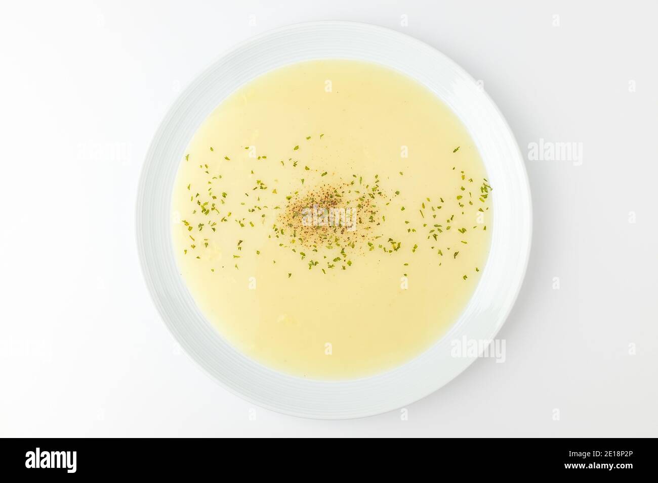 Cream soup on white background Stock Photo - Alamy