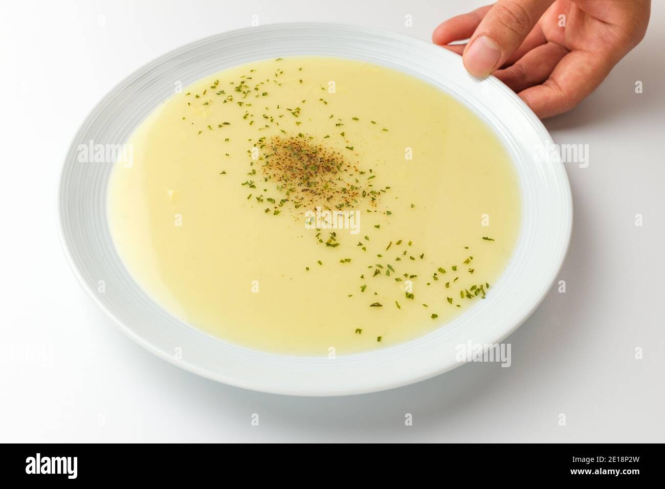 Cream soup on white background Stock Photo - Alamy