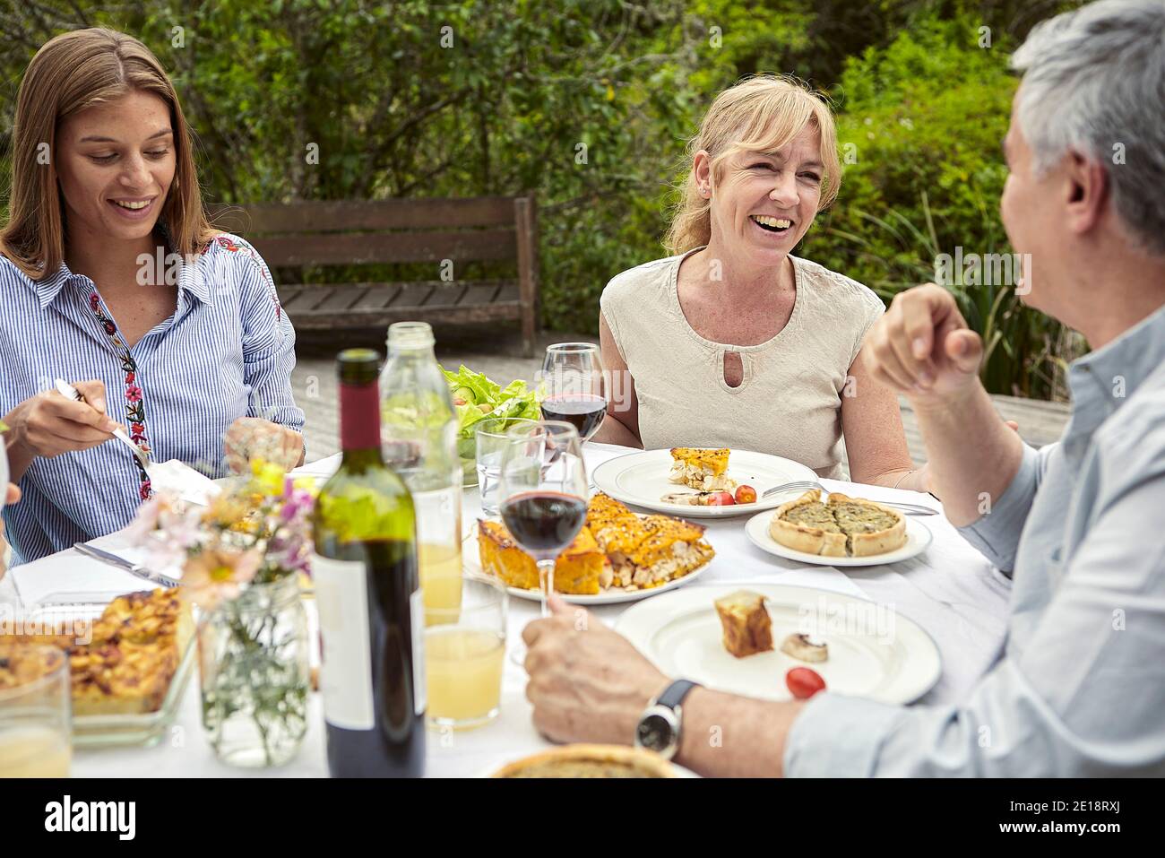 Happy family having meal Stock Photo