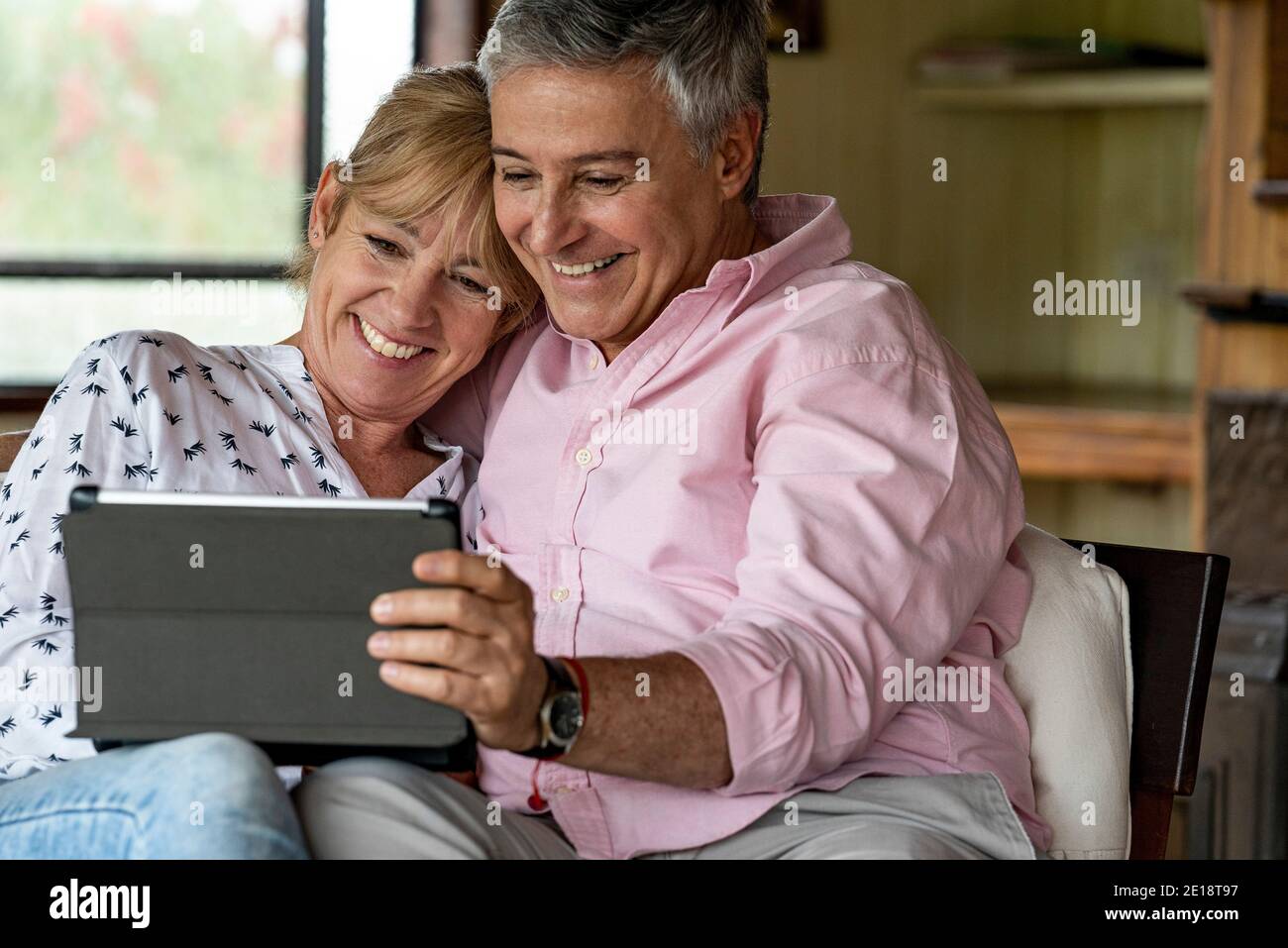 Senior couple using digital tablet Stock Photo