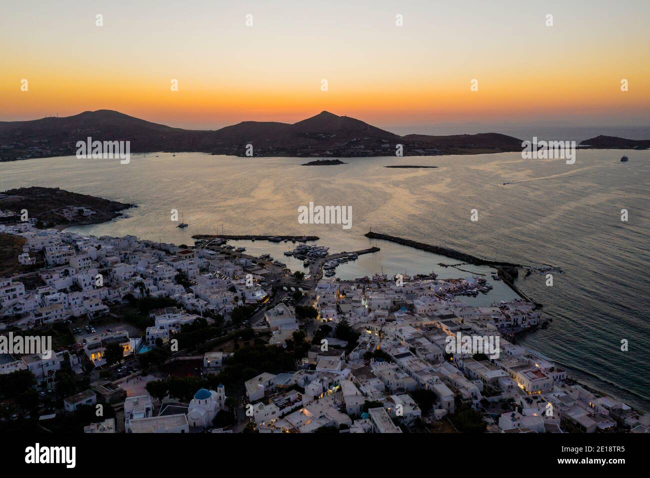 Aerial shot of Naousa town in Paros island, during sunset. Stock Photo