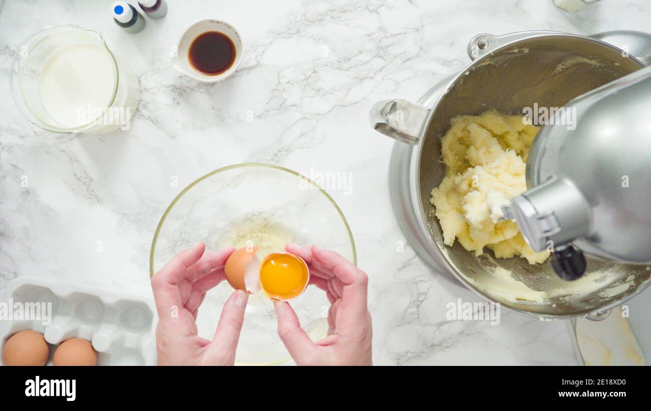 Step by step. Flat lay. Mixing ingredients in standing kitchen mixer to