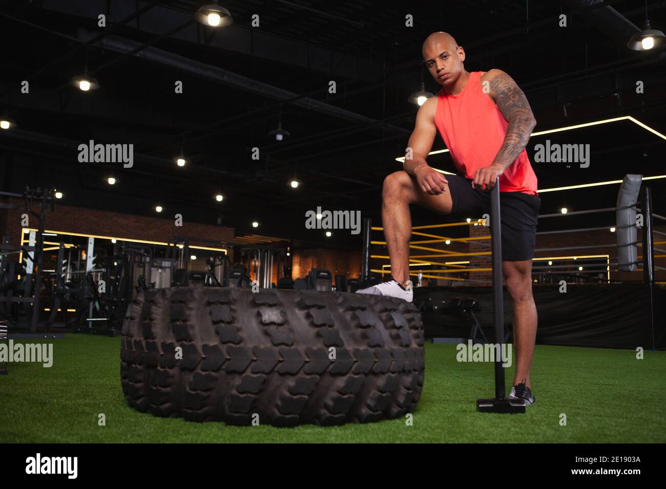 Crossfit sledge hammer man workout hires stock photography and images