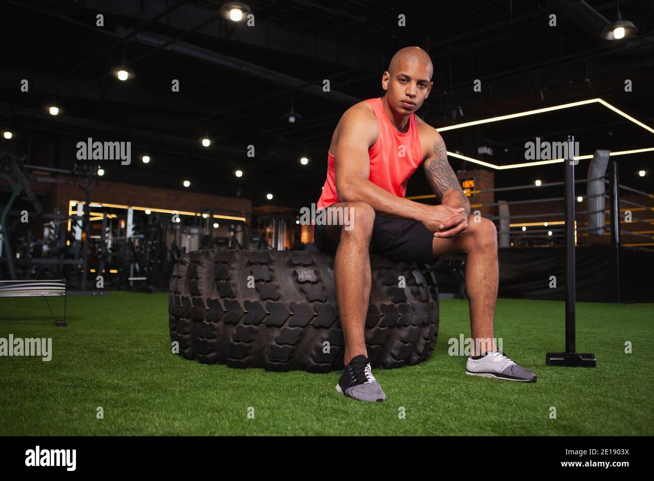 Crossfit sledge hammer man workout hires stock photography and images
